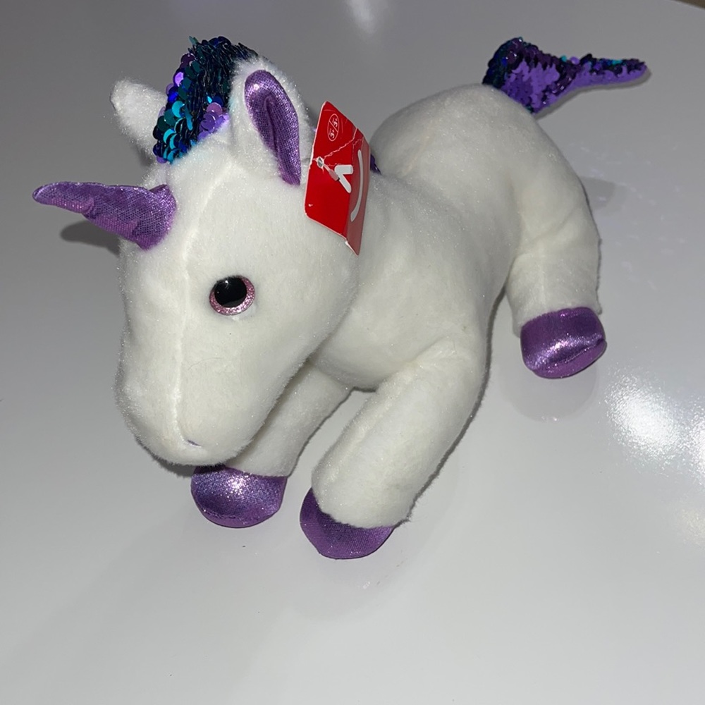 Purple unicorn stuffed animal